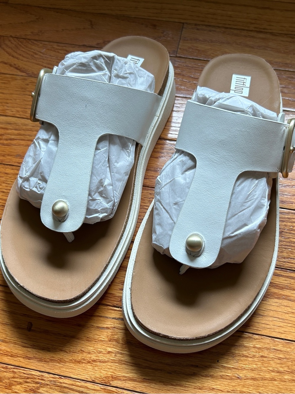 FitFlop White Buckle Leather Toe-Post Sandals with Gold Accent